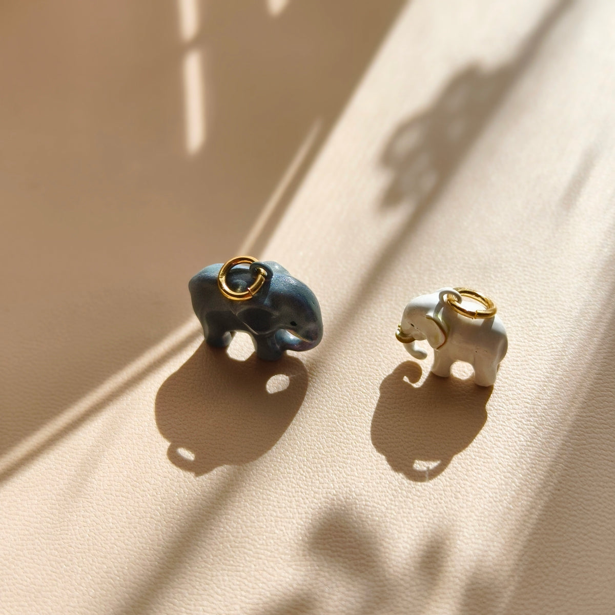 Steady Steps – Blue Rambler & Gentle Giant Elephant Pendant / Charm Pair
