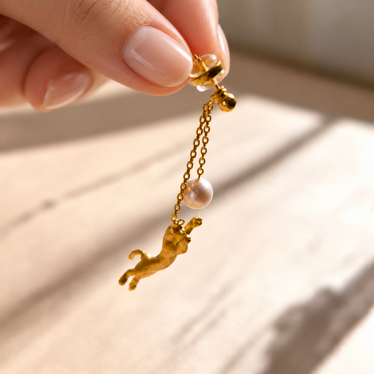 Playful Pearl-Chasing Cat Drop Earrings – Gold-Plated Copper & Pearl