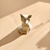 A Little Cat by the Window – Glossy White Ceramic Figurine