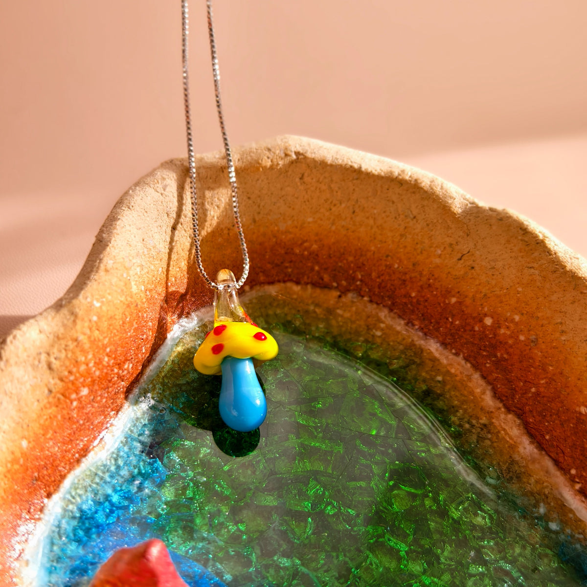 A Glimmer Along the Woodland Path – Coloured Glass Mushroom Pendants