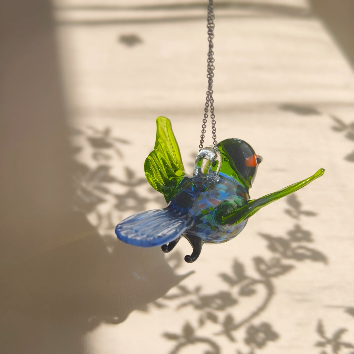A Bright Visitor in the Orchard – Coloured Glass Bird Hanging Ornament