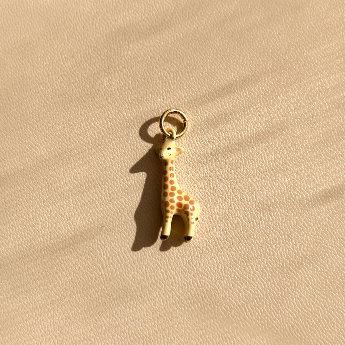 2. Amber Stroller — actual giraffe charm photograph