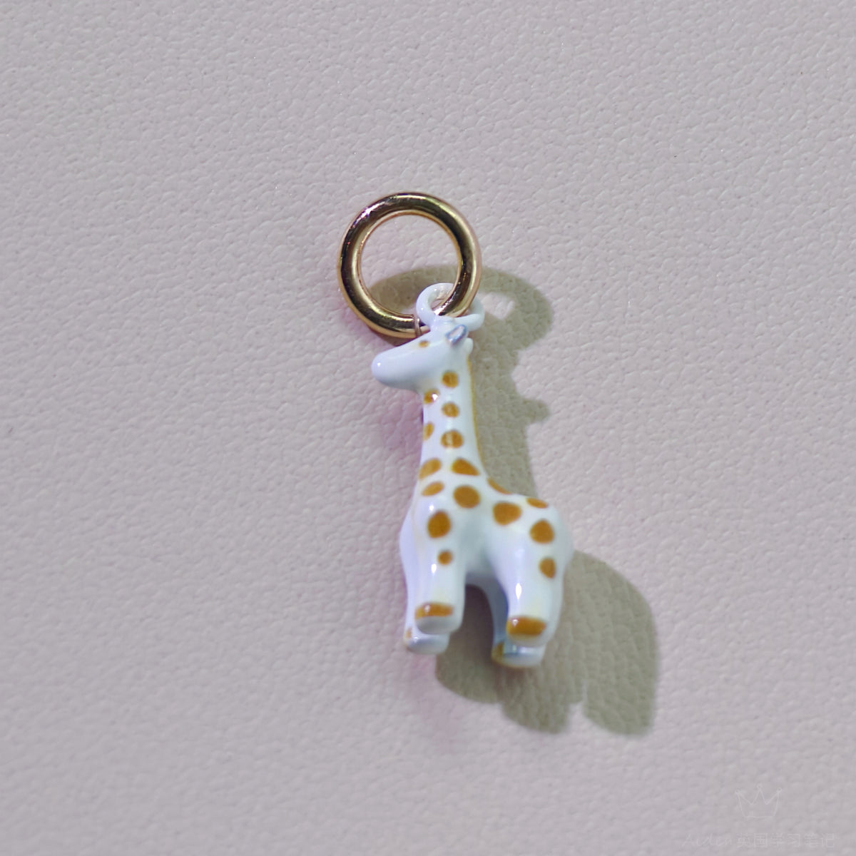 3. Ivory Wanderer — actual giraffe charm photograph