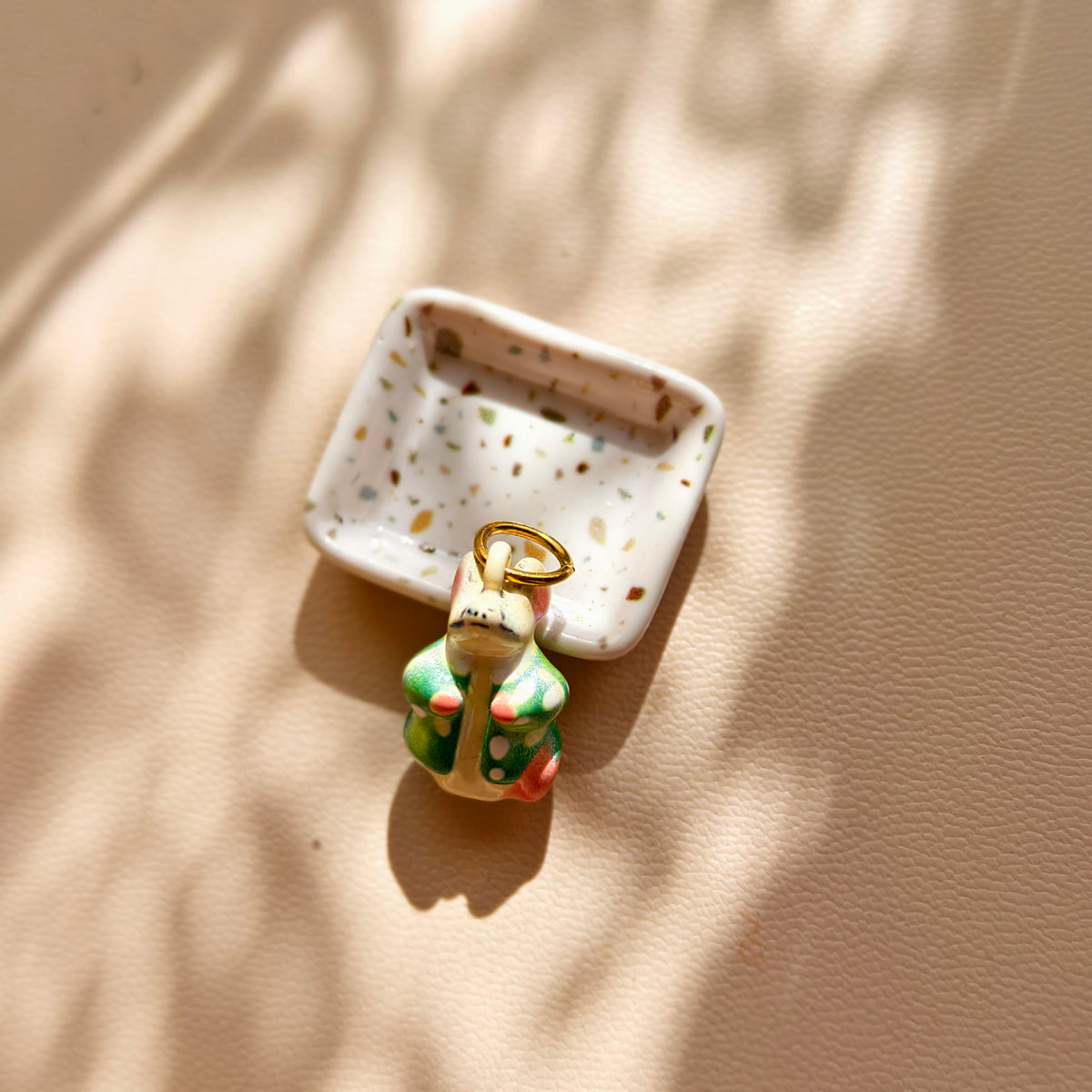 No. 4 Clover Gentleman charm, actual product photograph