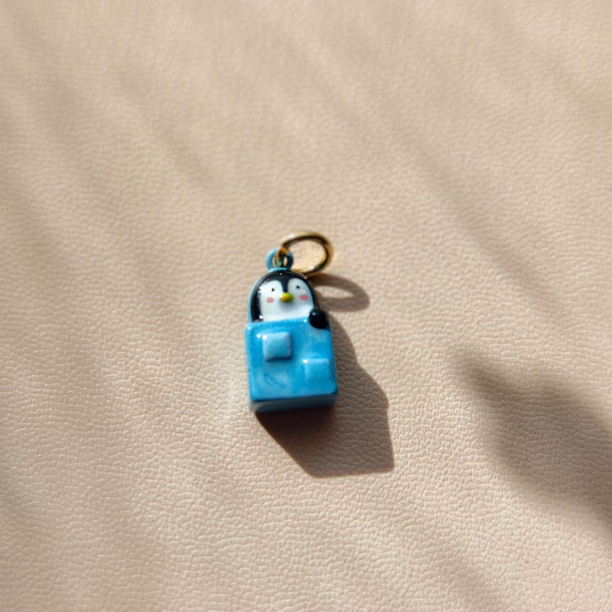 The Penguin Tea-Room Queue – Copper & Stainless Steel Penguin Charms & Pendants