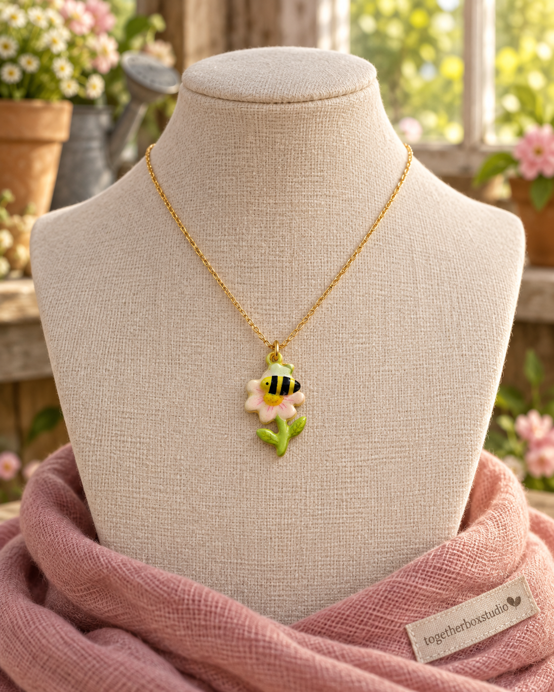Blossom Visitor charm on a fine necklace