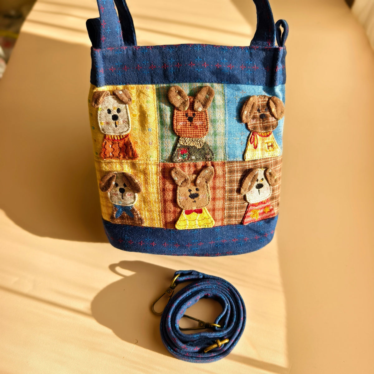 Storybook Dogs Navy Patchwork Bucket Bag – Hand-Embroidered Details