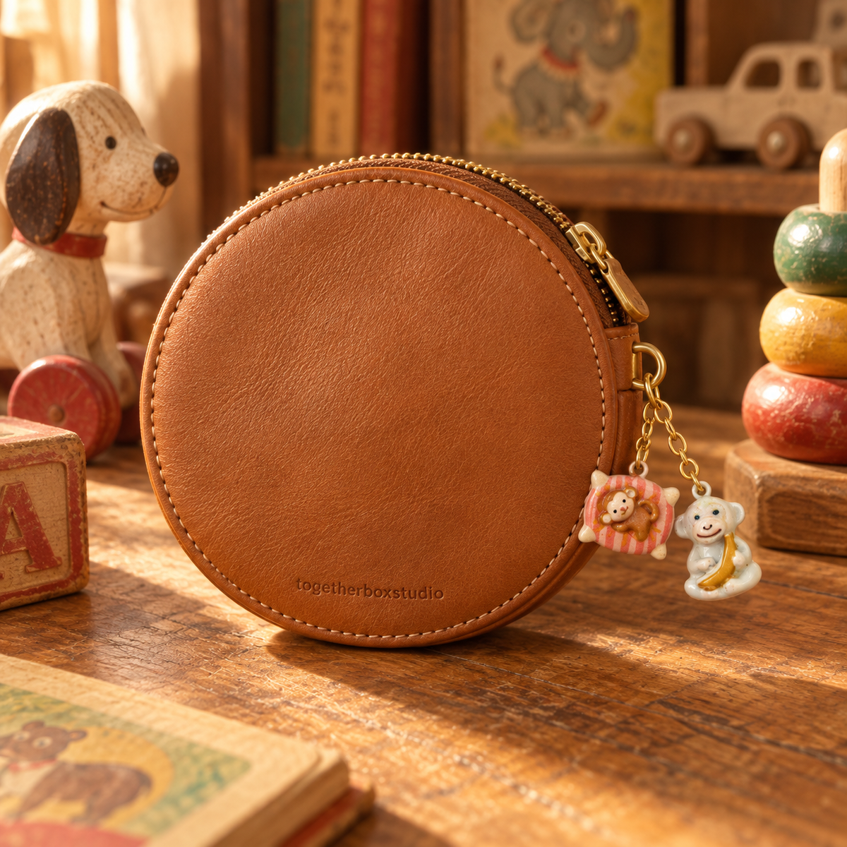 bag styling of miniature monkey charms; accessories and props not included