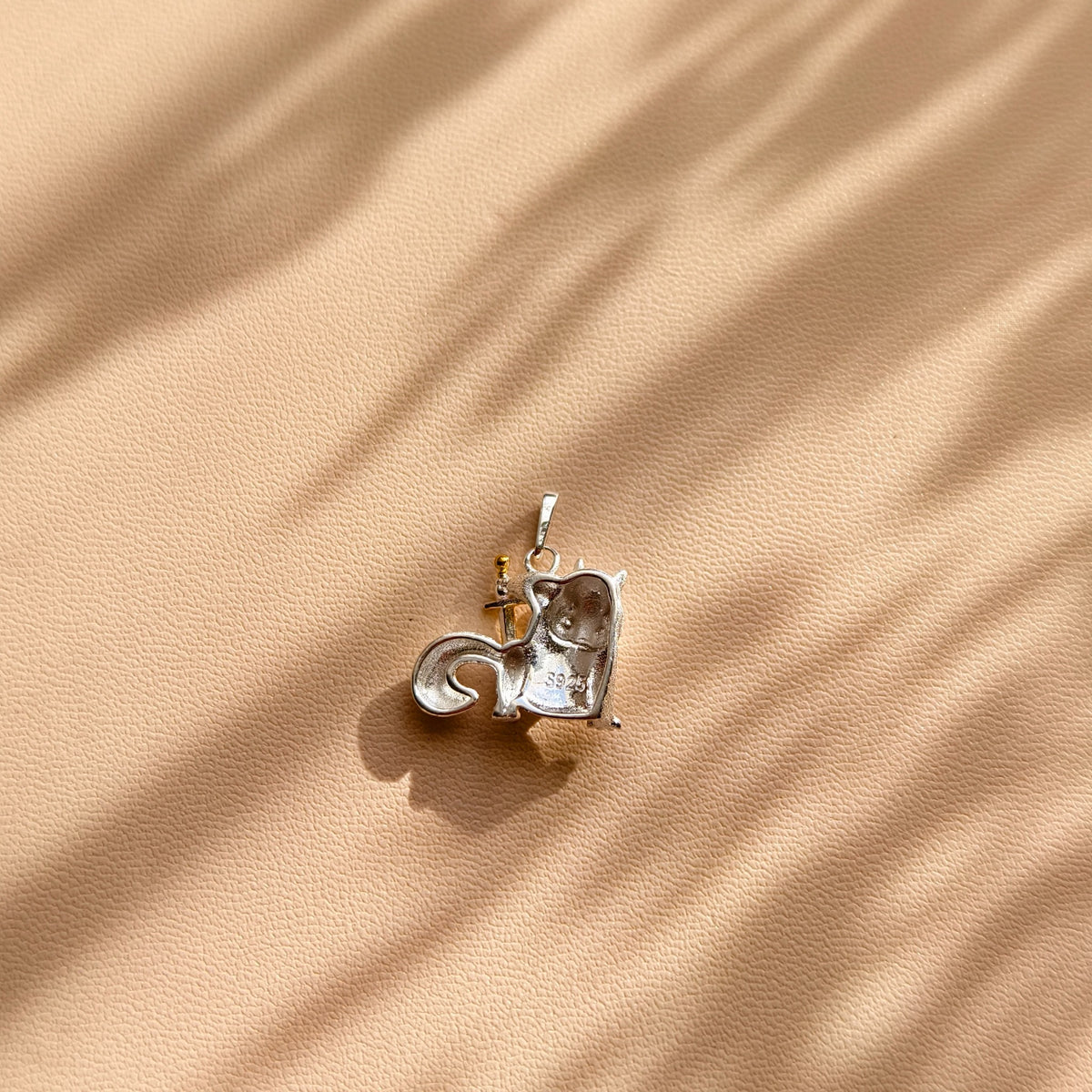 Back view of the Warrior Squirrel pendant showing the S925 hallmark
